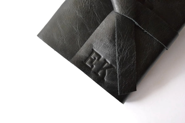 Example of stamped personalized initials on Black leather journal cover