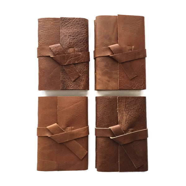 4 Examples of Golden Brown Journals with Extra Character Leather Covers