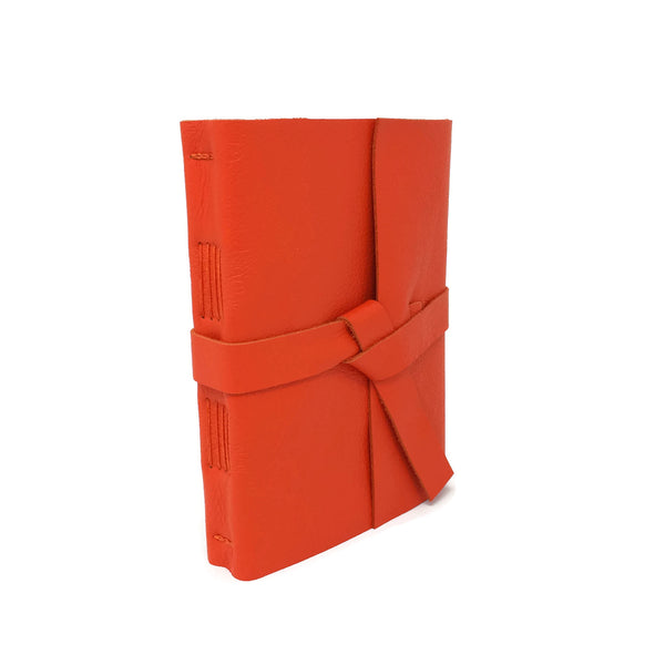 Front angled view of Orange Leather Journal