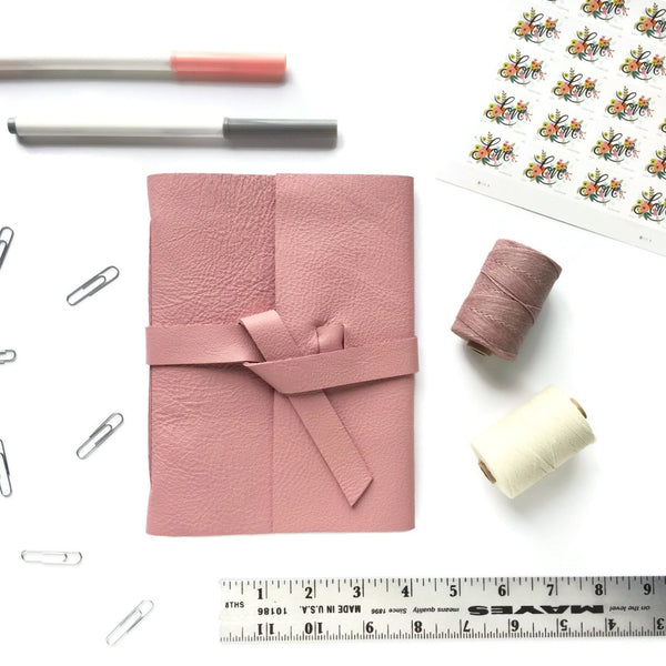 Blush Pink Journal flat lay surrounded by office accessories